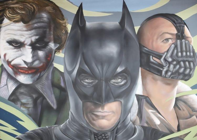 Portada de Batman toma León: el mural que reúne al Guasón y más íconos del universo